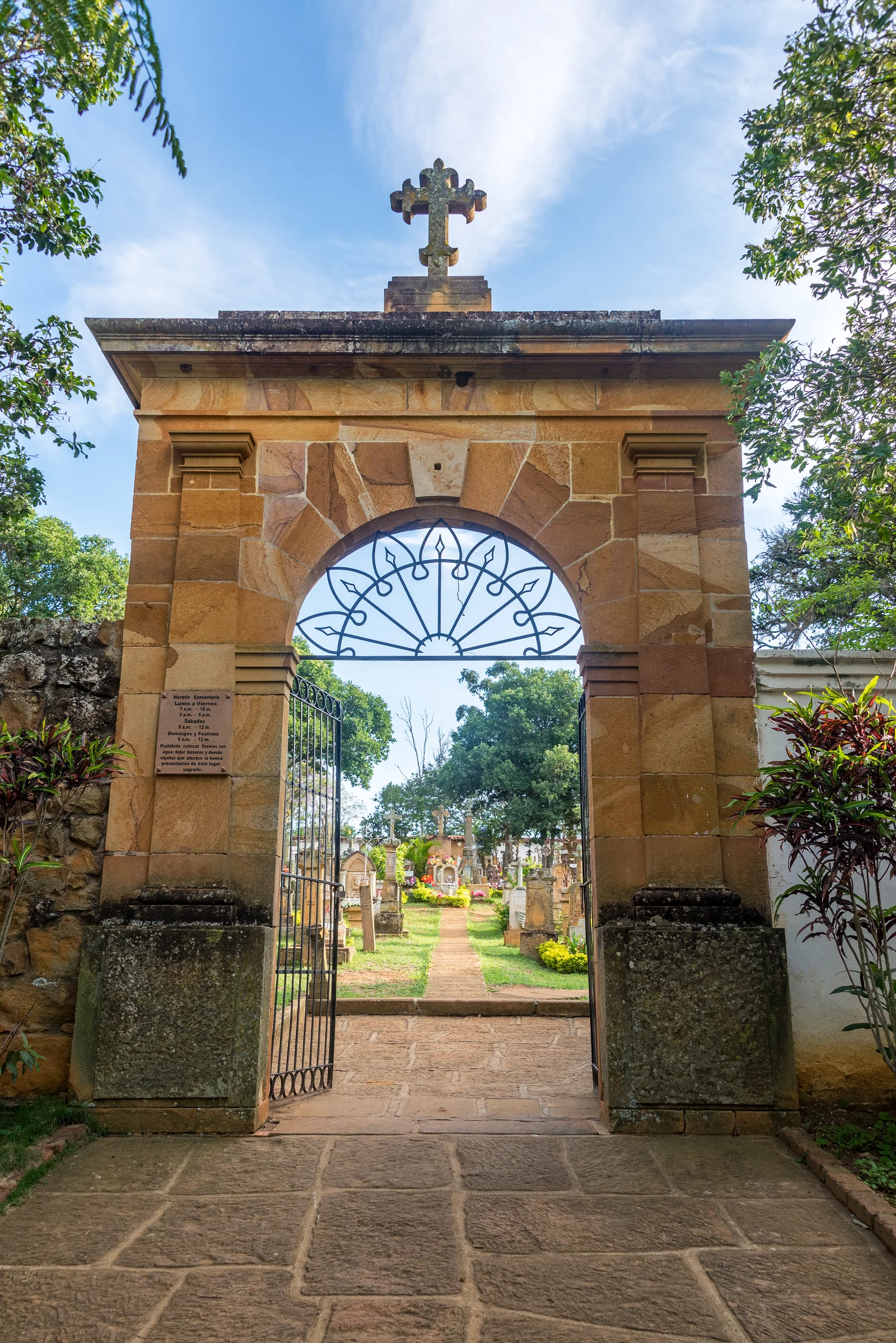Cemetery path and headstones seen from standing height on a mobile friendly cemetery website